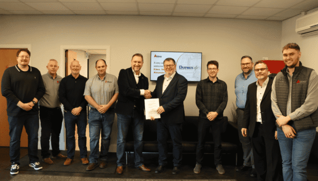 the staff of abbey and and durwen are holding up a partnership agreement